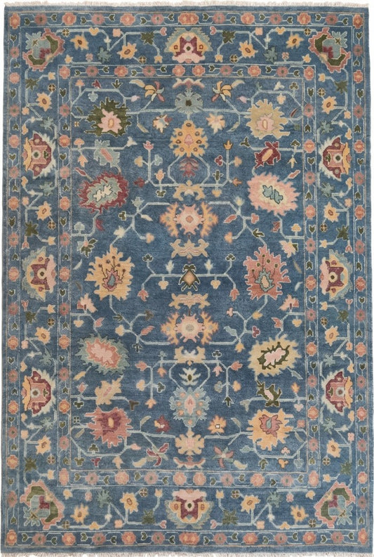 Indigo Blossom Hand-Knotted Oushak Carpet featuring Symmetrical Persian Botanical Motifs