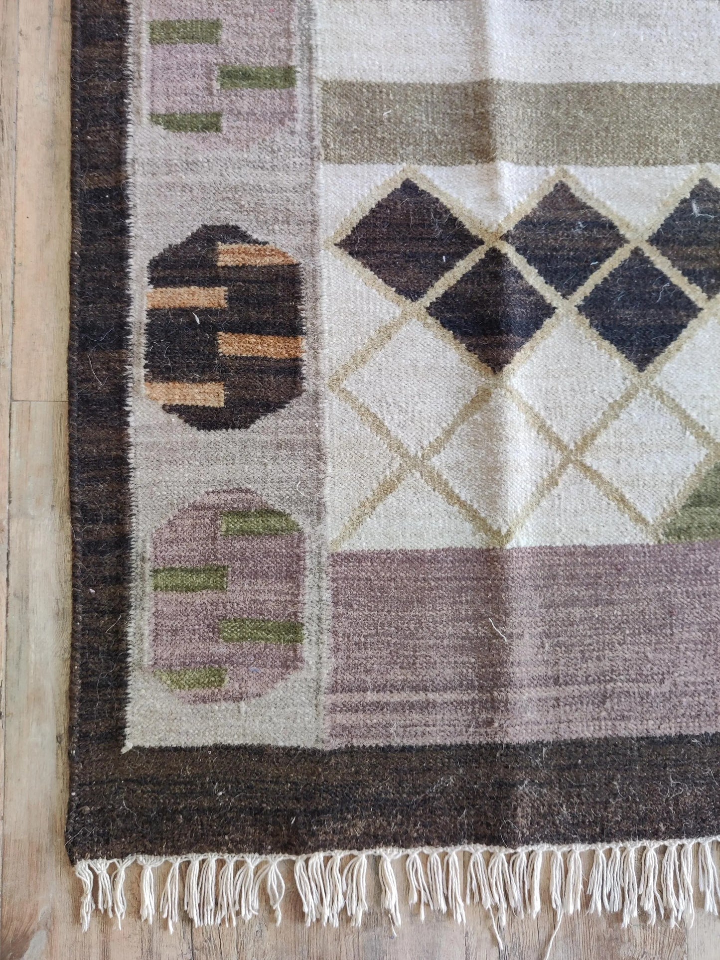 Earth Tone Geometric and Tribal Motif Area Rug