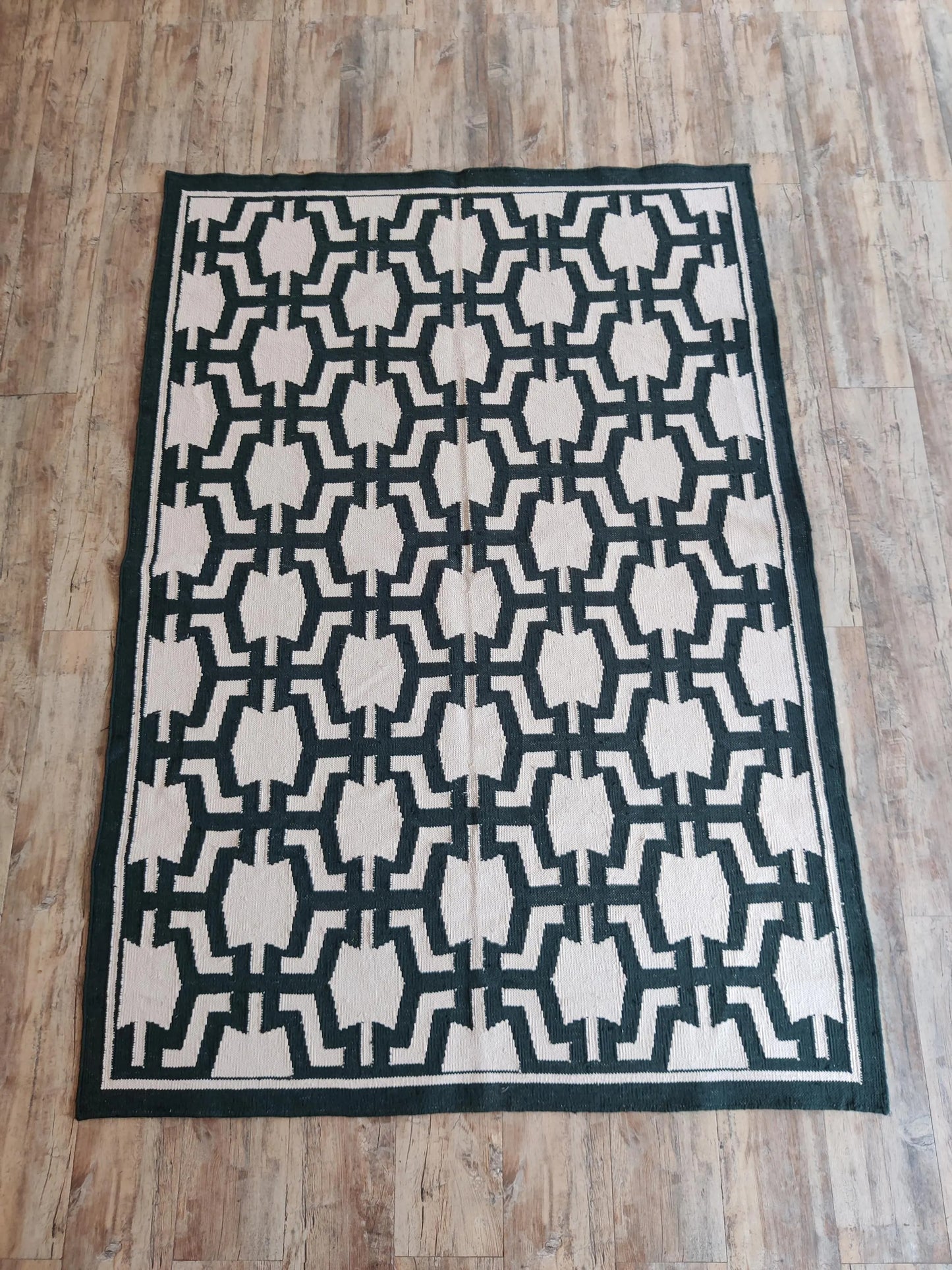 The Emerald Maze Handwoven Cotton Dhurrie rug
