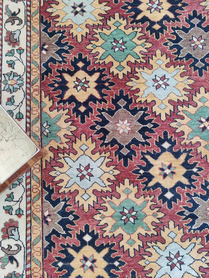 Hand-Knotted Serrated Medallion Tribal Wool Rug