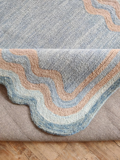 Muted Azure Blue with Scalloped Wavy Border rug