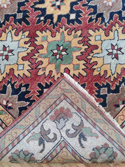 Hand-Knotted Serrated Medallion Tribal Wool Rug