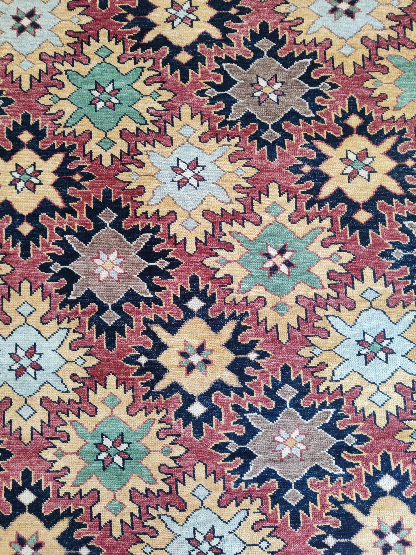 Hand-Knotted Serrated Medallion Tribal Wool Rug