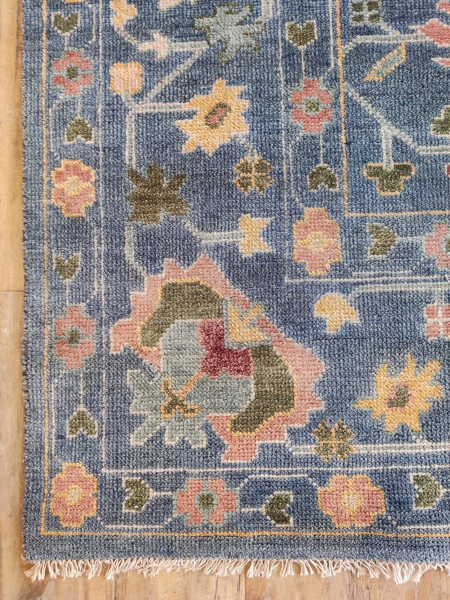 Indigo Blossom Hand-Knotted Oushak Carpet featuring Symmetrical Persian Botanical Motifs