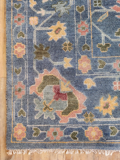 Indigo Blossom Hand-Knotted Oushak Carpet featuring Symmetrical Persian Botanical Motifs