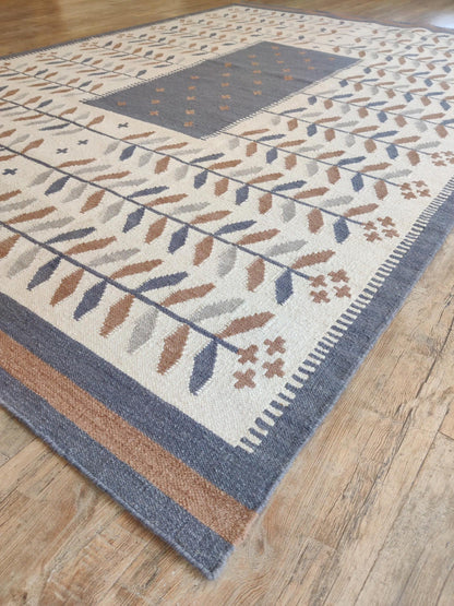 Earthy Terracotta and Blue Boho Dhurrie rug