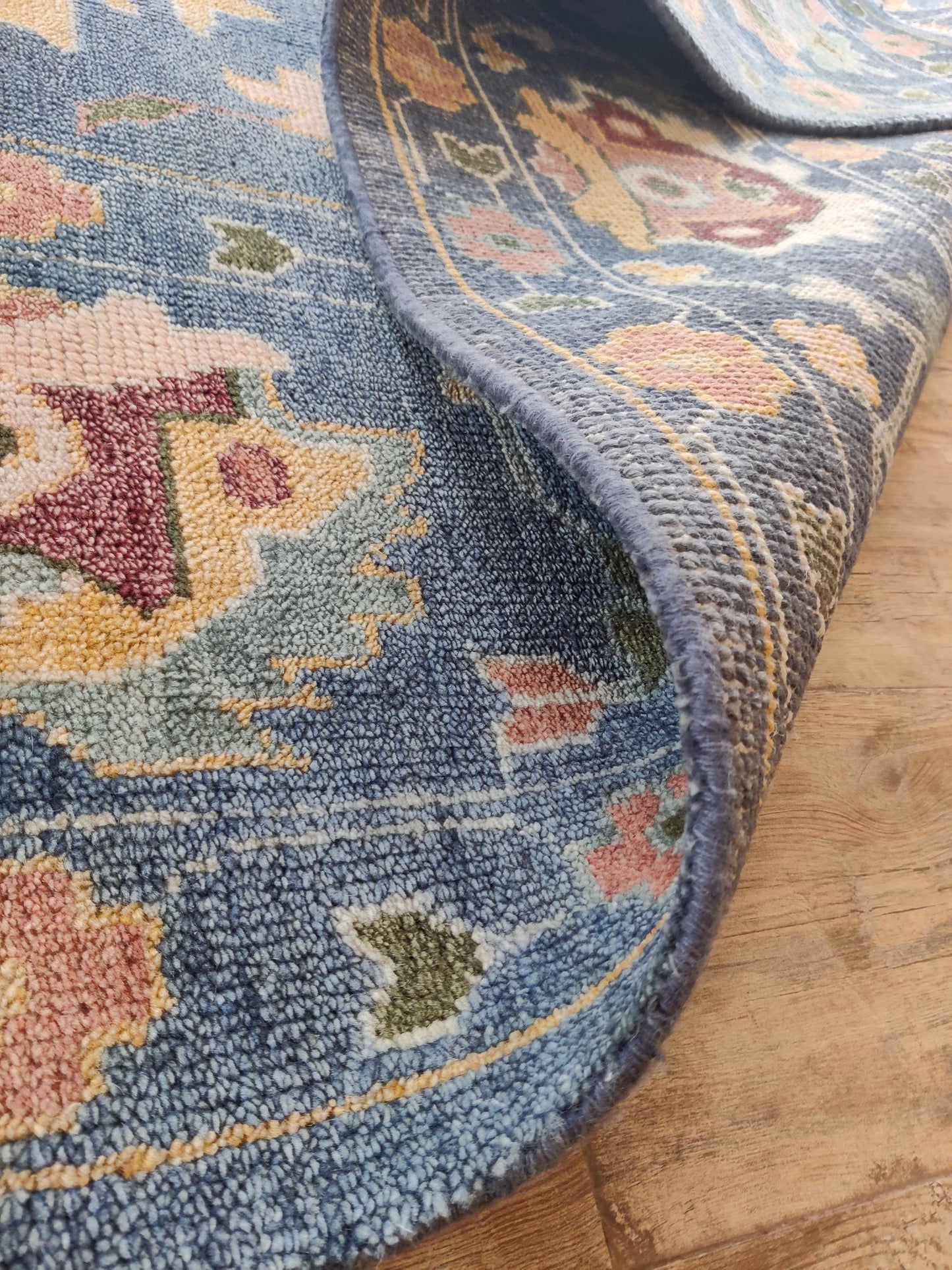 Indigo Blossom Hand-Knotted Oushak Carpet featuring Symmetrical Persian Botanical Motifs