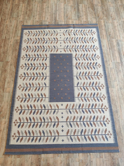 Earthy Terracotta and Blue Boho Dhurrie rug