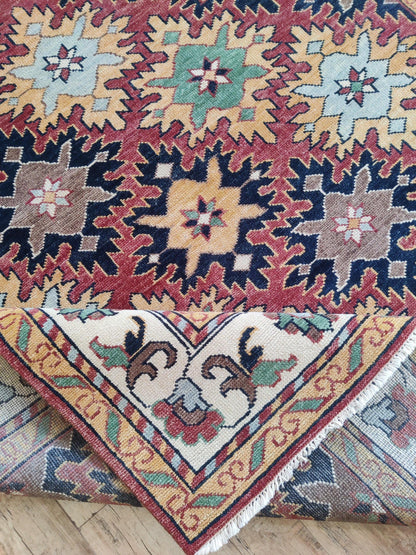 Hand-Knotted Serrated Medallion Tribal Wool Rug