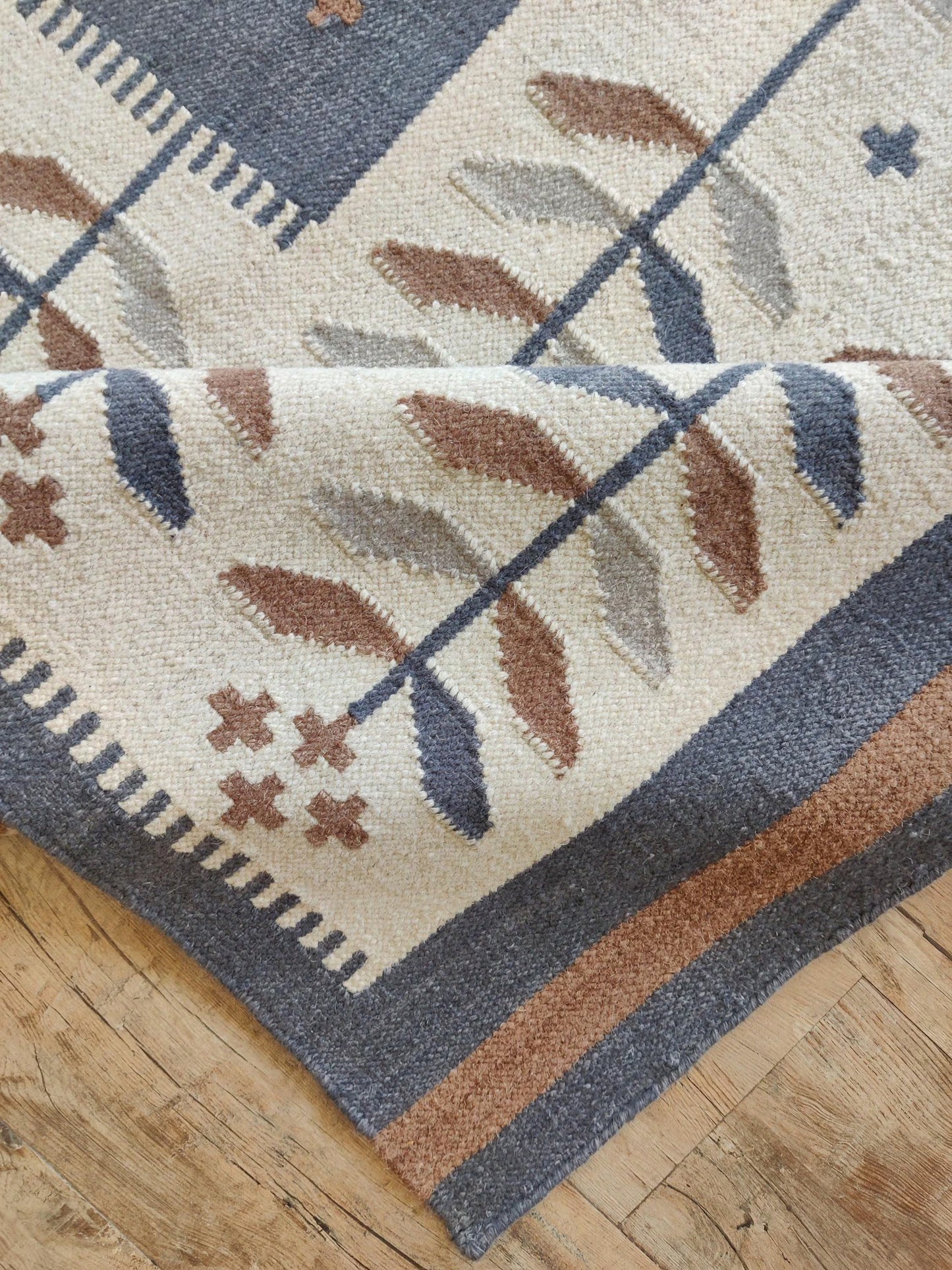 Earthy Terracotta and Blue Boho Dhurrie rug