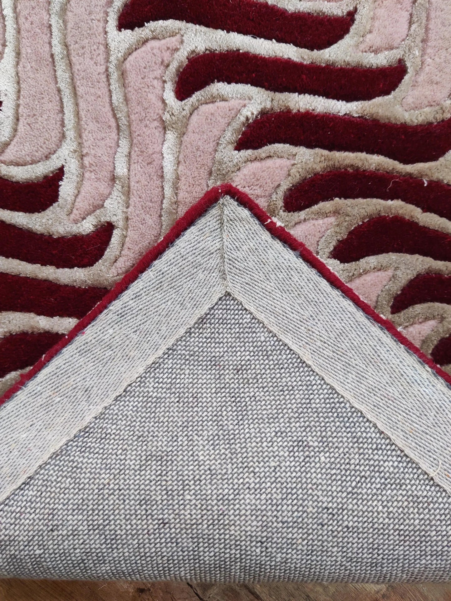 Dynamic Geometric Wool Rug Undulating Chevron Pattern