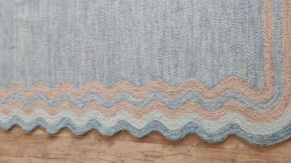 Muted Azure Blue with Scalloped Wavy Border rug