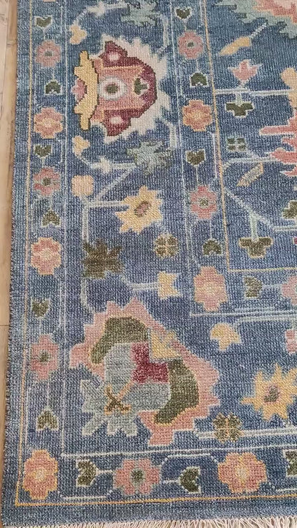 Indigo Blossom Hand-Knotted Oushak Carpet featuring Symmetrical Persian Botanical Motifs