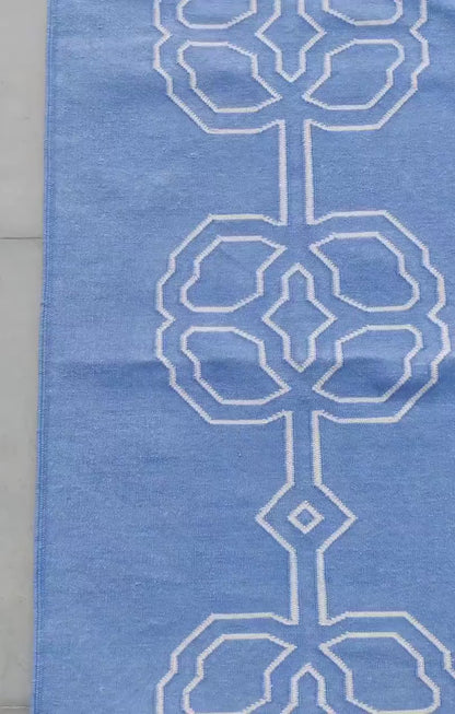 Modern Interlocking Cornflower Blue Geometric Area Rug